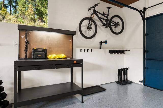 The bike maintenance station, with wall hooks