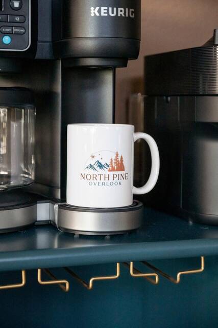 A North Pine Overlook mug on the coffee machine