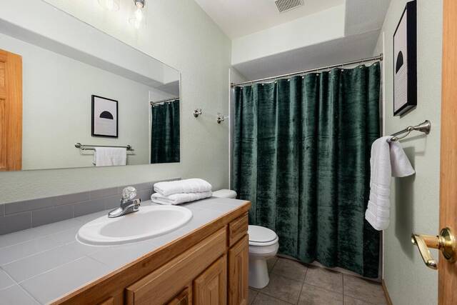 The second bathroom, with vanity and shower